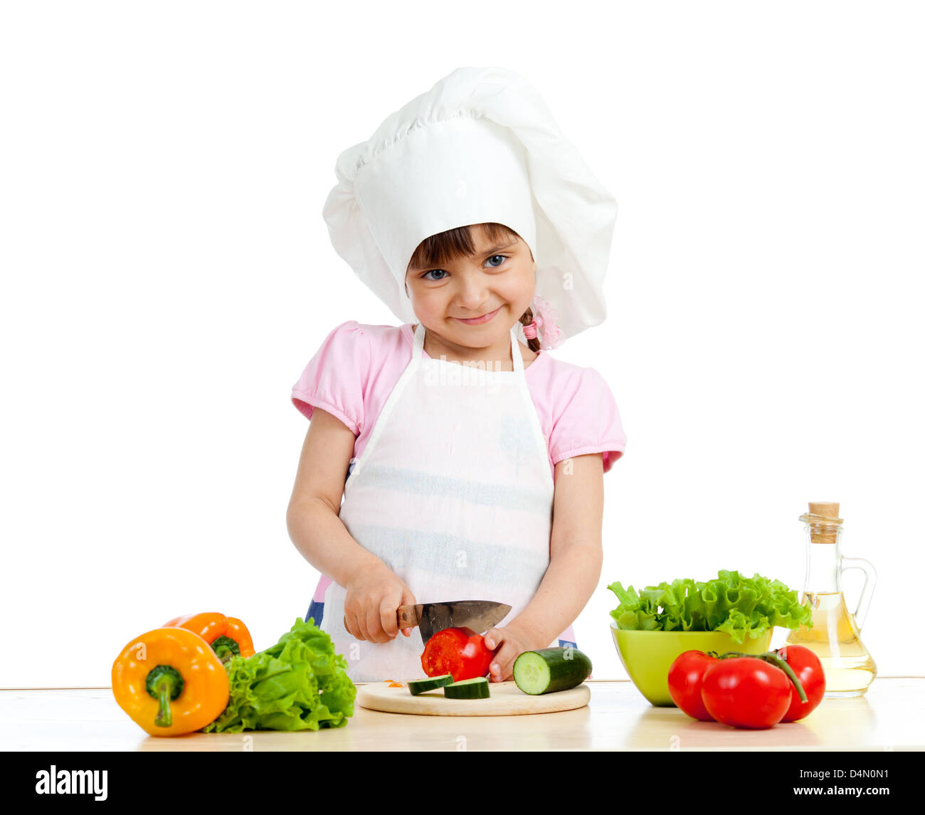 Chef girl preparing healthy food over white background Stock Photo - Alamy