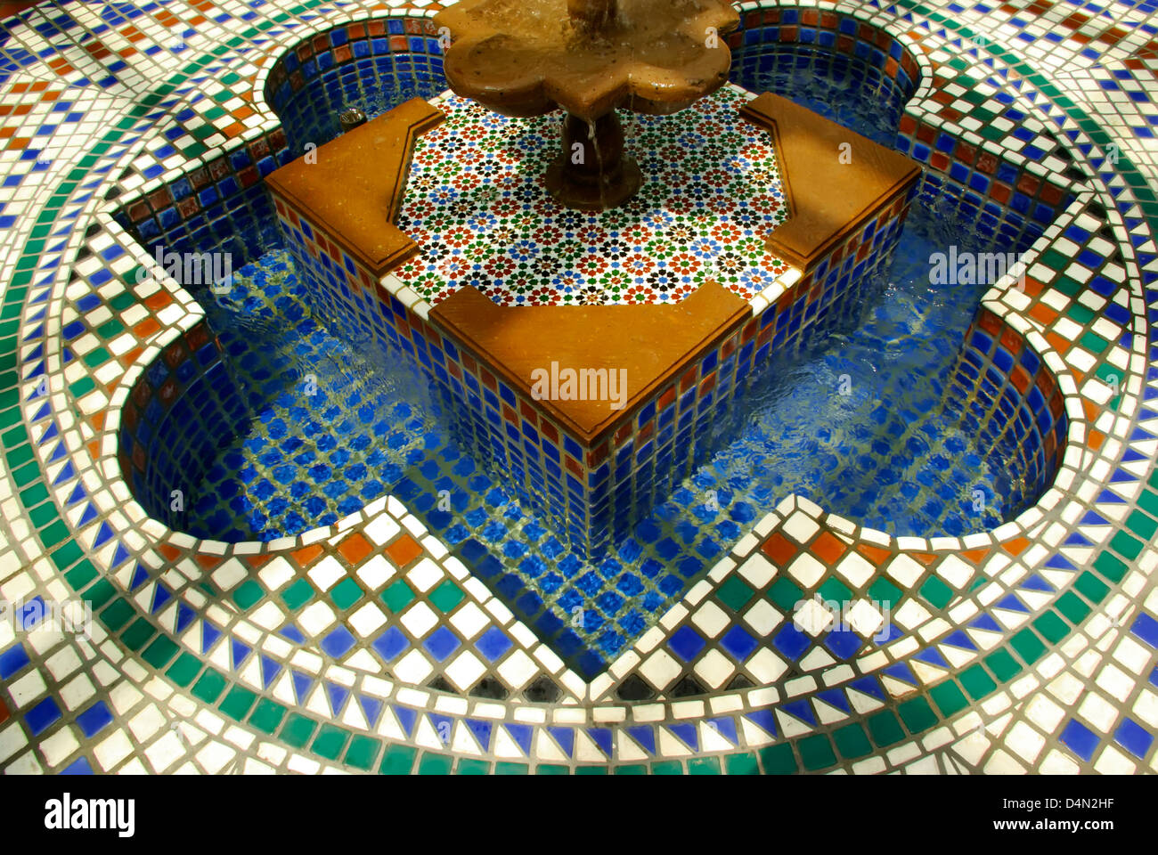 Overhead close view of beautiful, colorful tiled fountain in the Missouri Botanical Garden. Stock Photo
