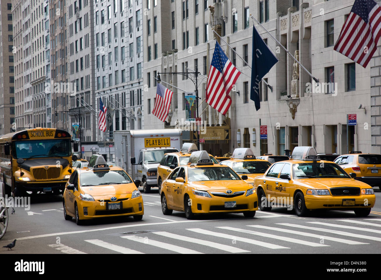 Street scene with yellow cabs and skyscrapers in Central Park South and ...