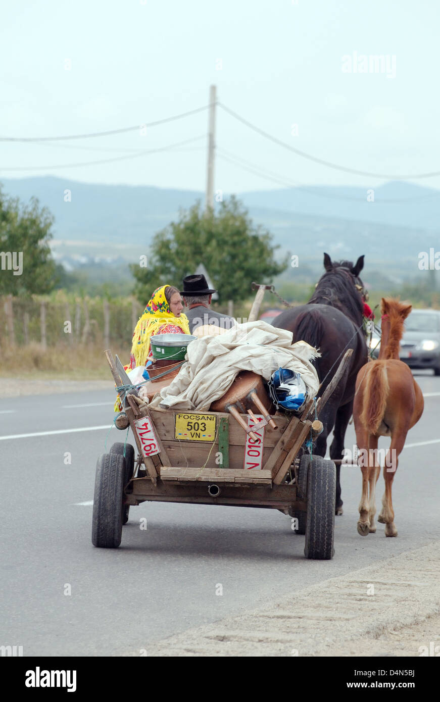 Gypsies ride in a cart, Brasov, Romania, Europe Stock Photo