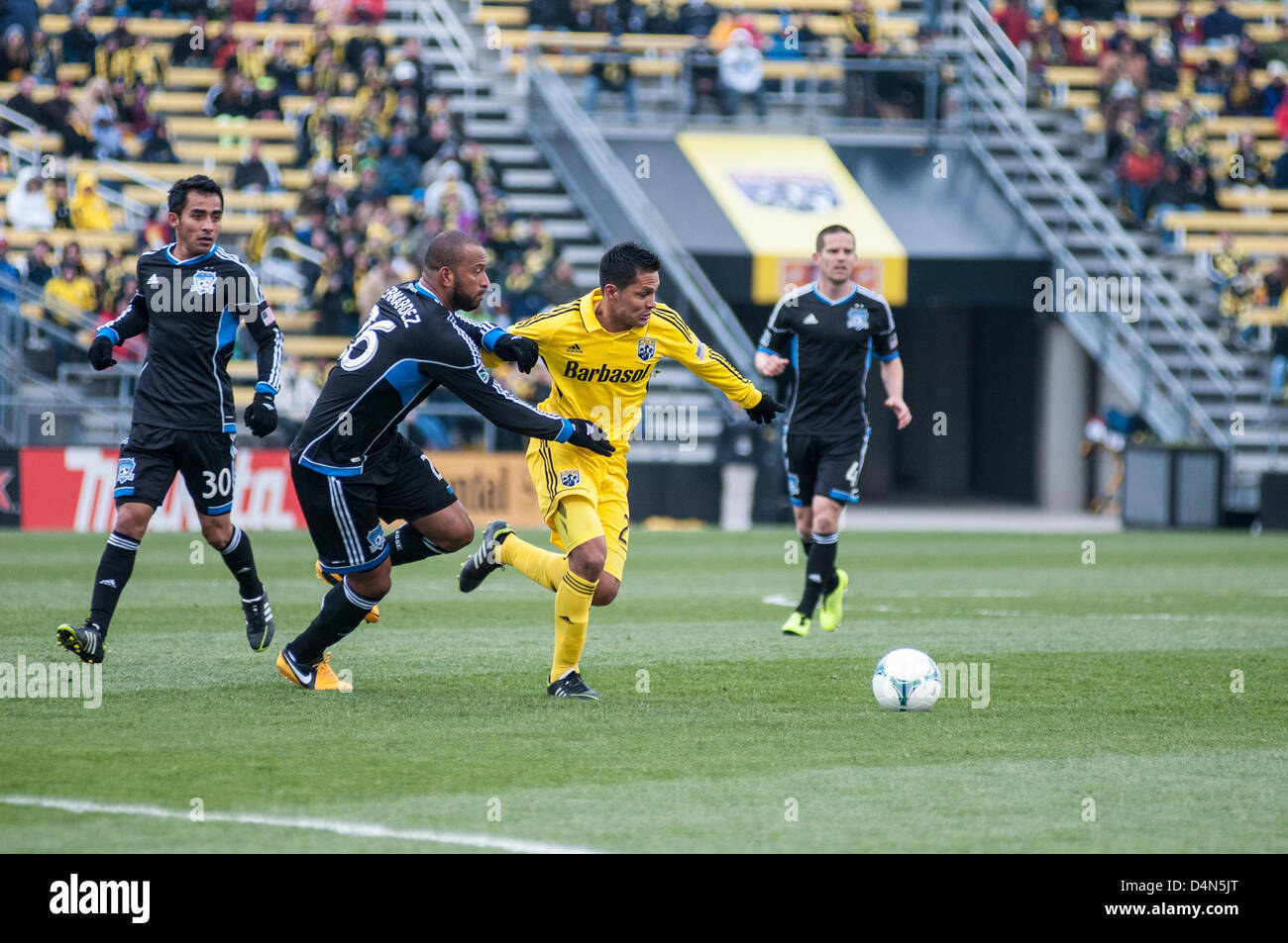 March 16, 2013 - Columbus, Ohio: Jairo Arrieta holds off San Jose's Bernardez  during the Columbus Crew's home opener of the 2013 MLS season at Crew Stadium in Columbus, Ohio. Stock Photo