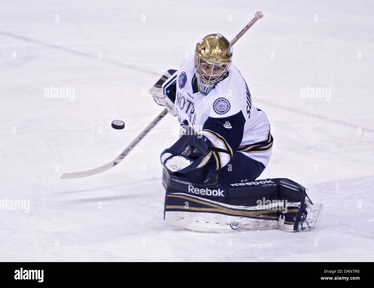 March 16, 2013 - South Bend, Indiana, United States of America - March 16, 2013: Notre Dame goaltender Steven Summerhays (1) makes the save during NCAA Hockey game action between the Notre Dame Fighting Irish and the Bowling Green Falcons at Compton Family Ice Arena in South Bend, Indiana. Notre Dame defeated Bowling Green 4-3. Stock Photo
