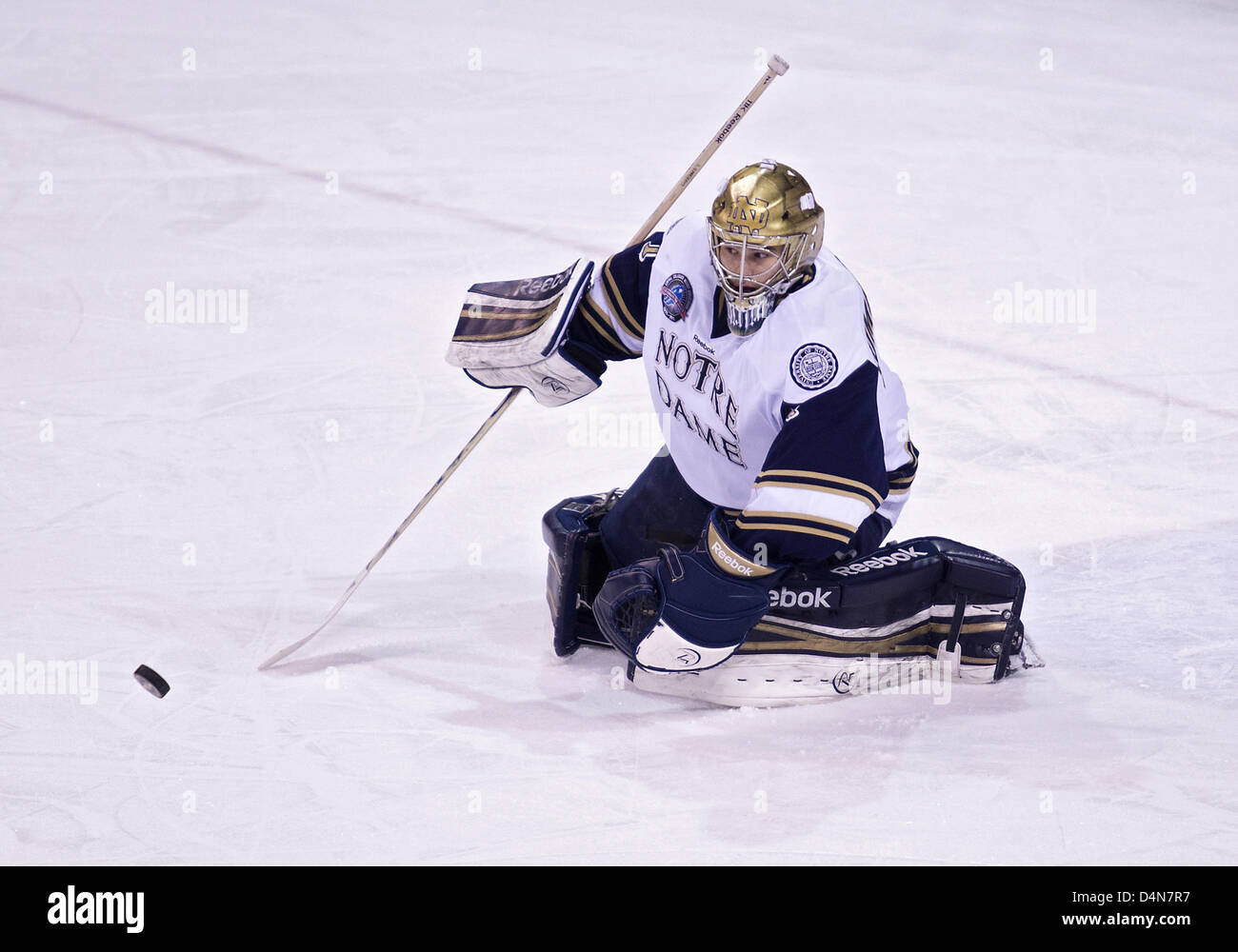 March 16, 2013 - South Bend, Indiana, United States of America - March 16, 2013: Notre Dame goaltender Steven Summerhays (1) makes the save during NCAA Hockey game action between the Notre Dame Fighting Irish and the Bowling Green Falcons at Compton Family Ice Arena in South Bend, Indiana. Notre Dame defeated Bowling Green 4-3. Stock Photo