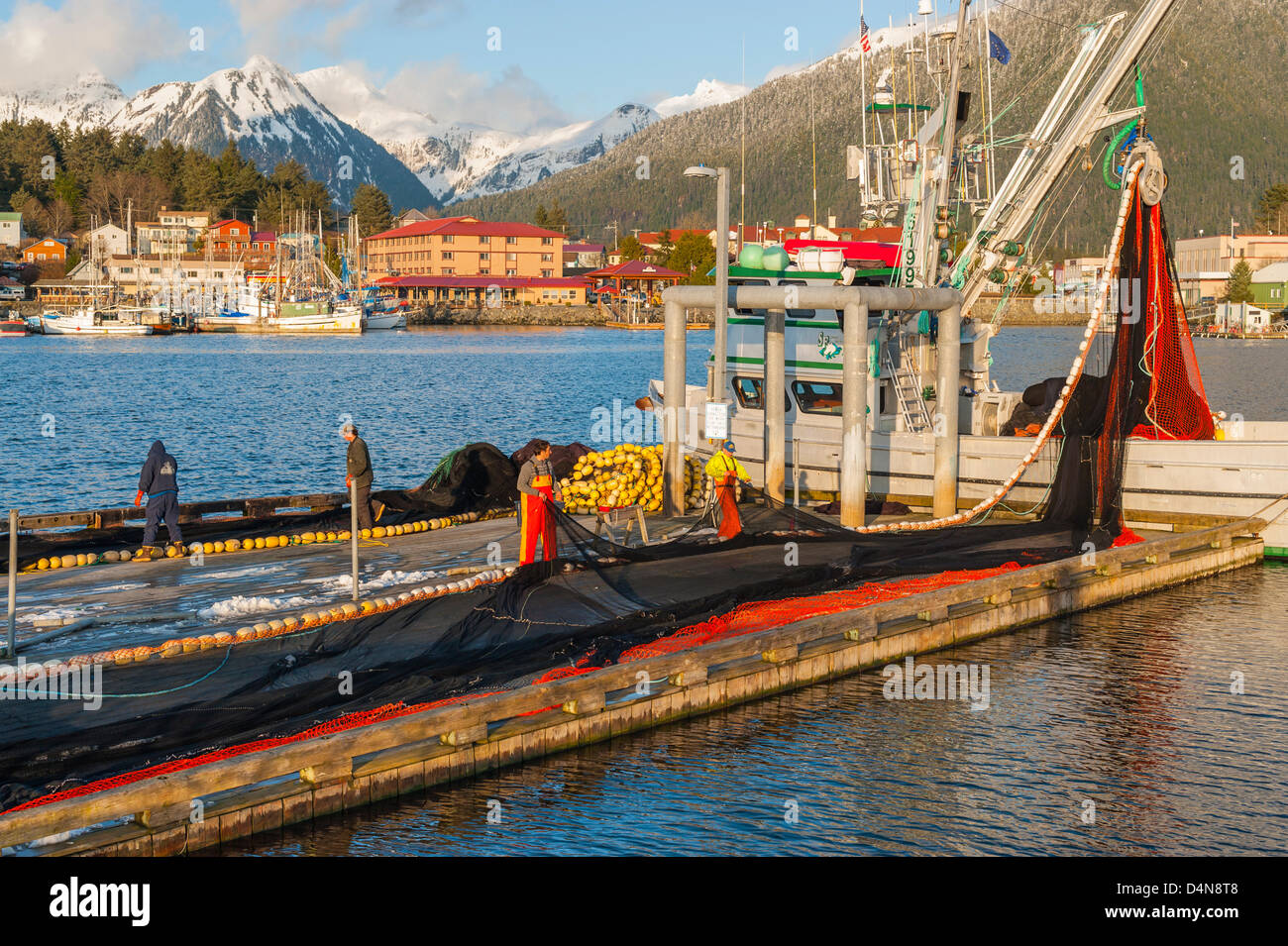 Sitka, Alaska 16 March 2013 Fishermen preparing purse seine for