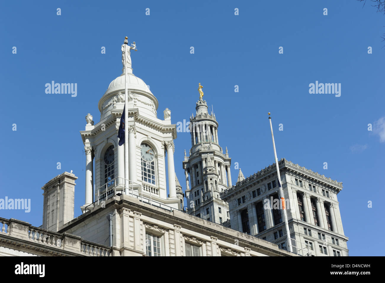 The cupola of New York's City Hall and of the city's Municipal Building, topped by a statue of Civic Fame. Stock Photo