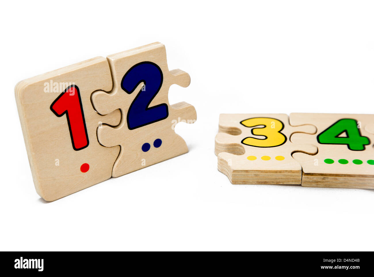 Puzzle pieces with color numbers. Stock Photo