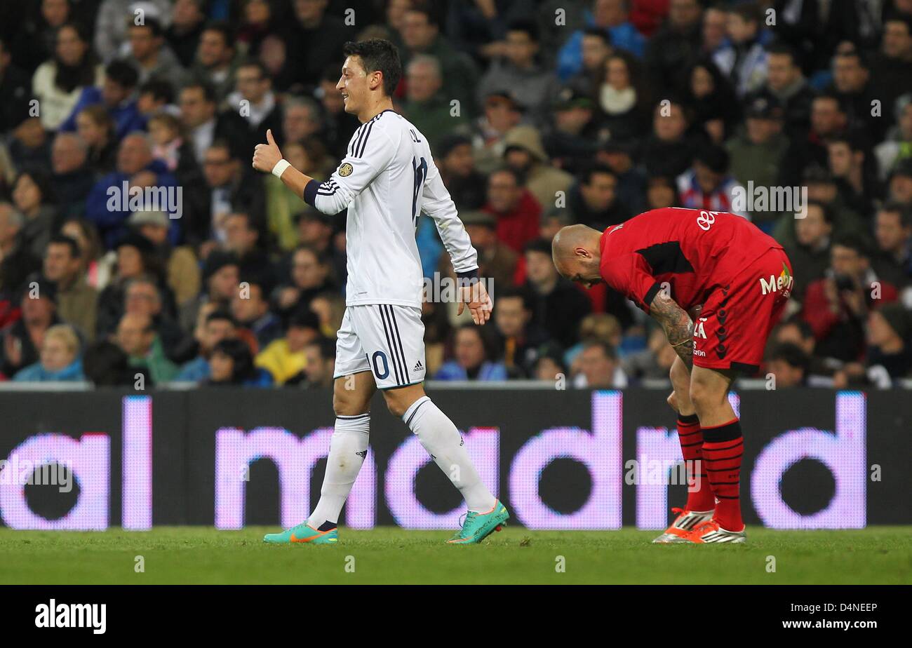 Real Madrid's Mesut Özil reacts during the Spanish Primera Division soccer match between Real Madrid and RCD Mallorca at Santiago Bernabeu stadium in Madrid, Spain, 16 March 2013. Madrid won 5:2. Photo: Fabian Stratenschulte/dpa/Alamy Live News Stock Photo