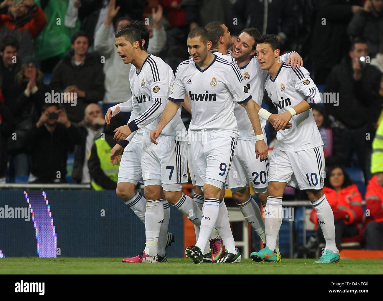 Real Madrid's Gonzalo Higuain (2nd R) celebrates his 4:2-goal with Mesut Özil (R), Pepe (3rd R), Karim Benzema (3rd L), Cristiano Ronaldo (2nd L) and Kaka (L) during during the Spanish Primera Division soccer match between Real Madrid and RCD Mallorca at Santiago Bernabeu stadium in Madrid, Spain, 16 March 2013. Madrid won 5:2. Photo: Fabian Stratenschulte/dpa/Alamy Live News Stock Photo
