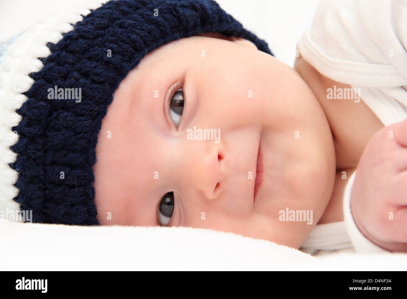 baby in knitted hat Stock Photo