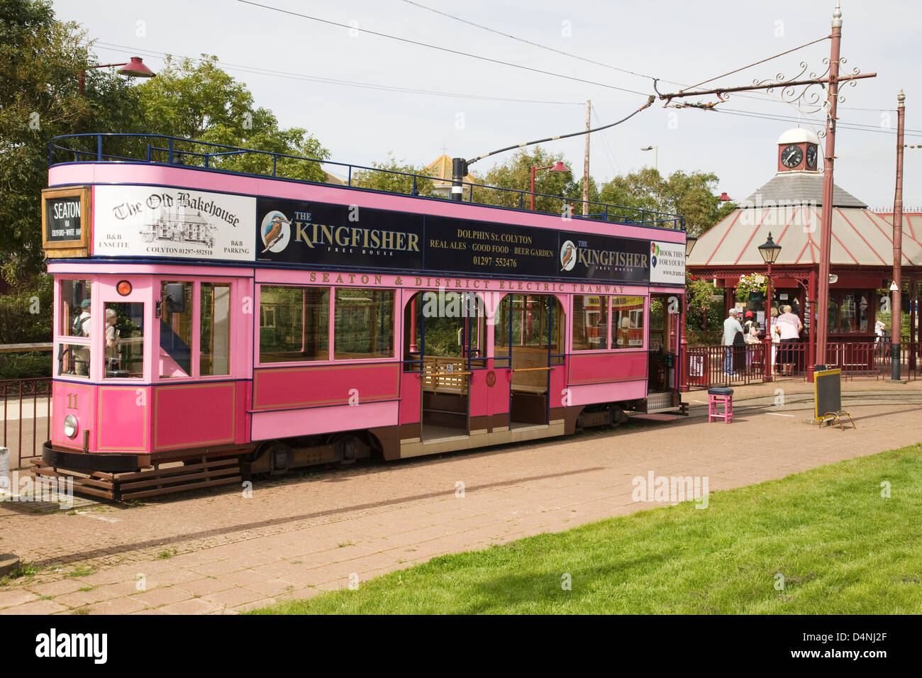 A pink tram at Seaton tram station in Devon, England, UK. Stock Photo
