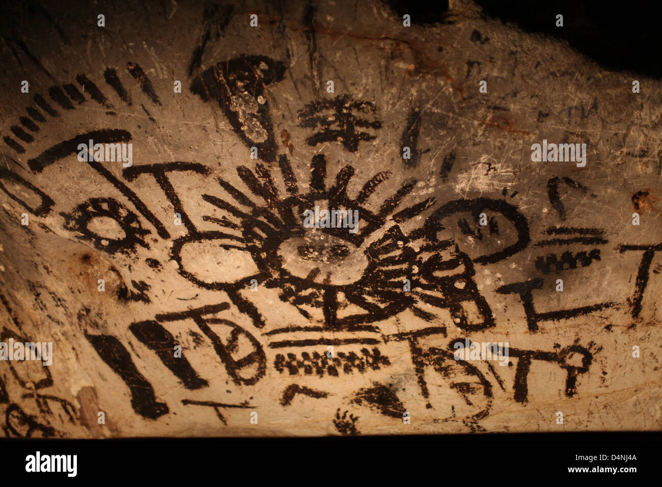 Cave ancient carvings Stock Photo