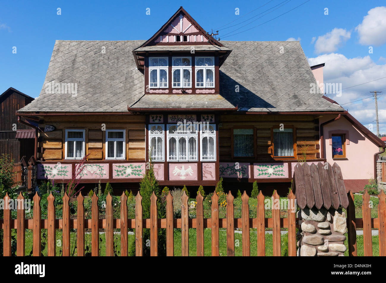 Traditionally built wooden house near Zakopane, Malopolska, Poland. Goral style. Stock Photo
