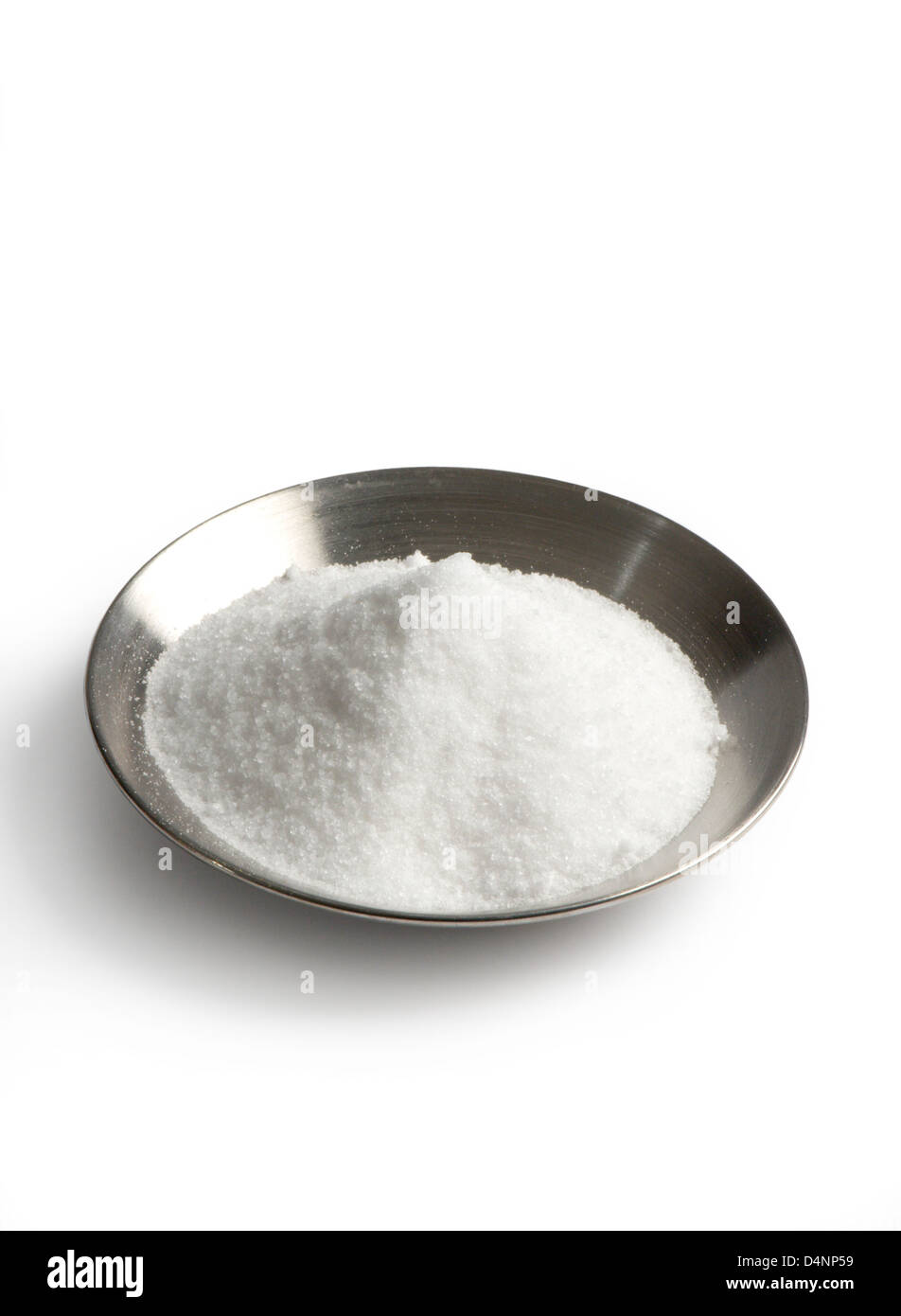 Table salt in small metal dsh Stock Photo