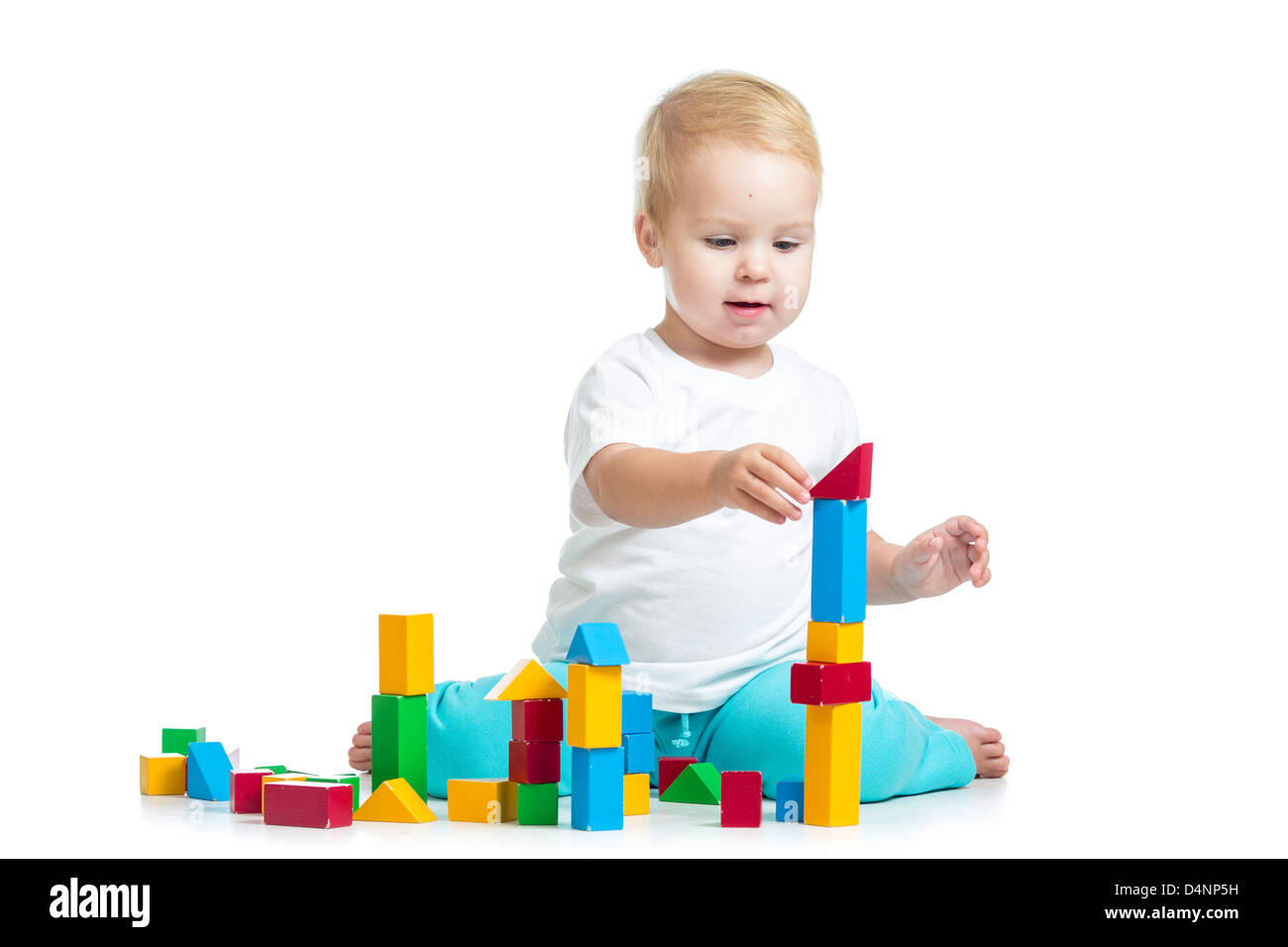 kid playing toy blocks isolated on white background Stock Photo - Alamy