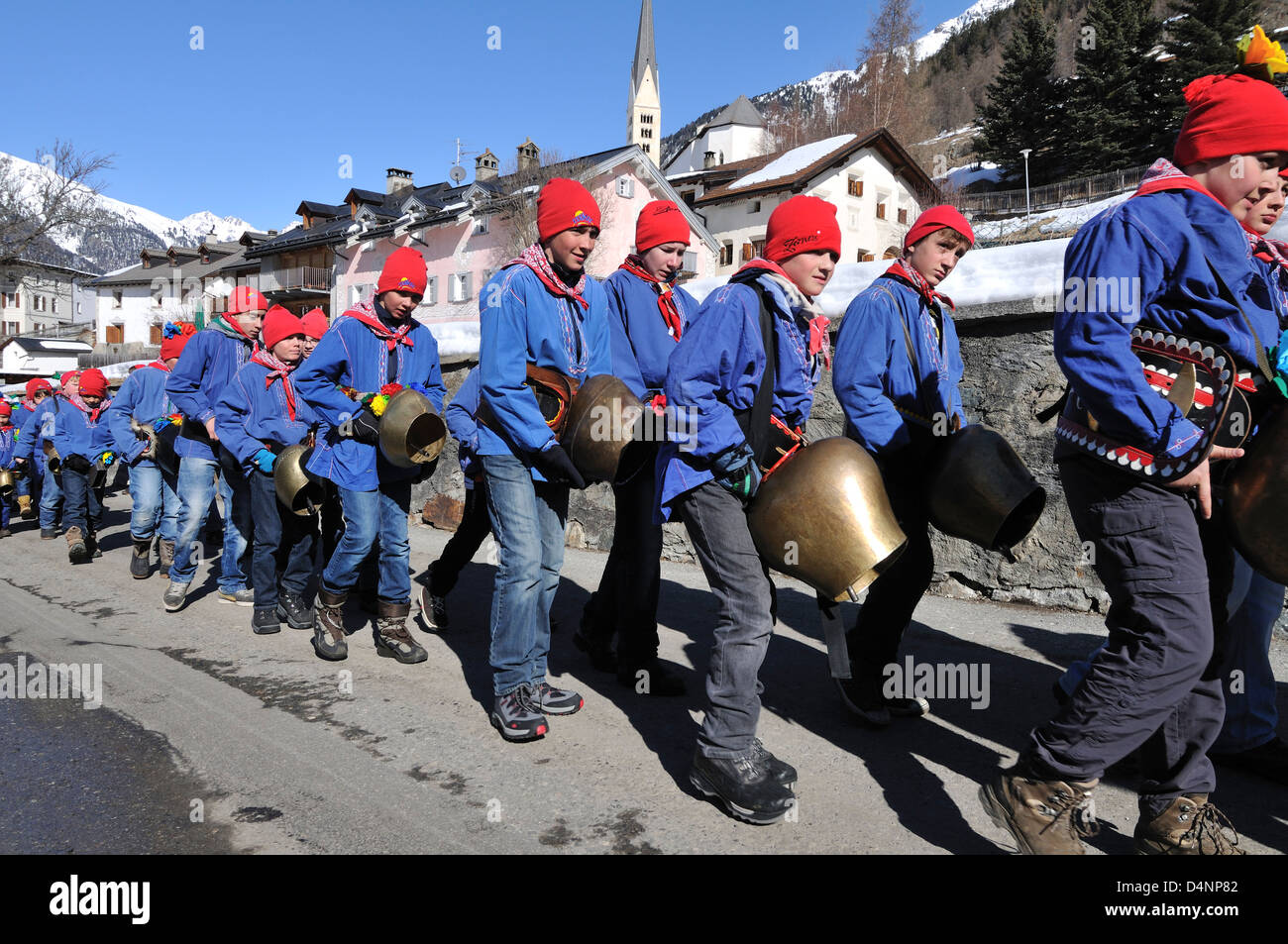 Children celebrating Chalandamarz, Zernez, Lower Engadine, Graubünden, Switzerland Stock Photo
