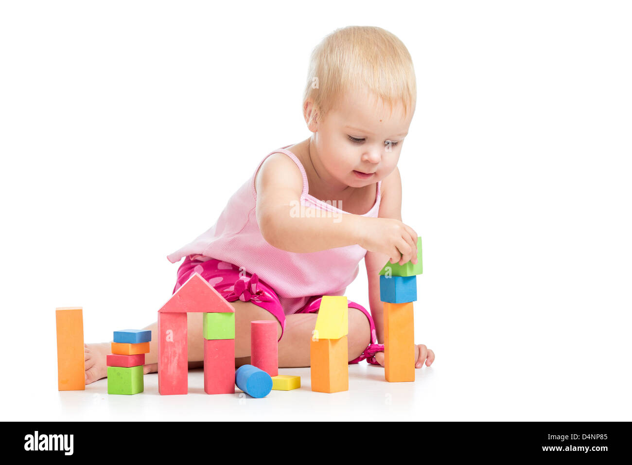 kid playing toy blocks isolated on white background Stock Photo - Alamy
