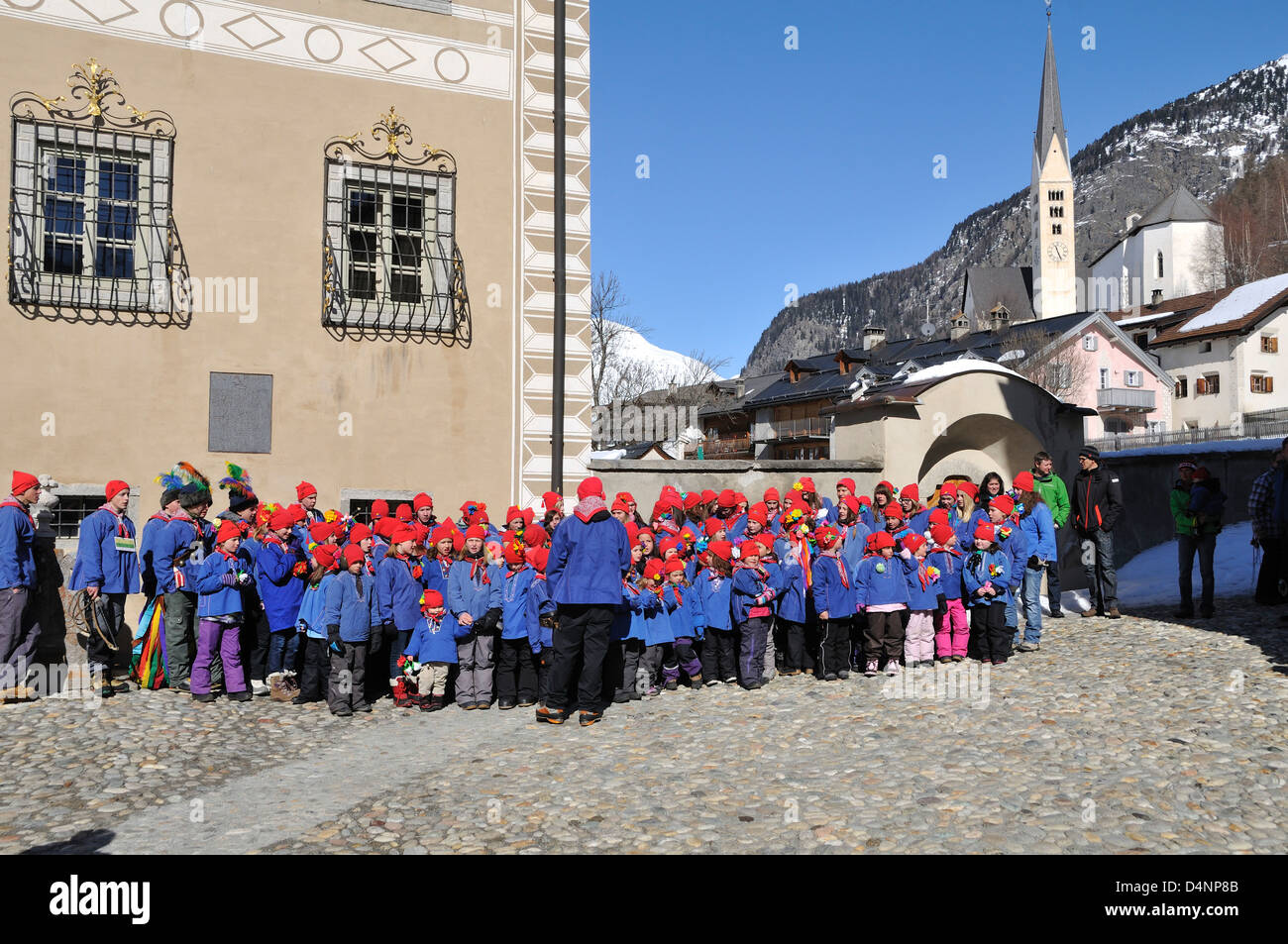 Children celebrating Chalandamarz, Zernez, Lower Engadine, Graubünden, Switzerland Stock Photo