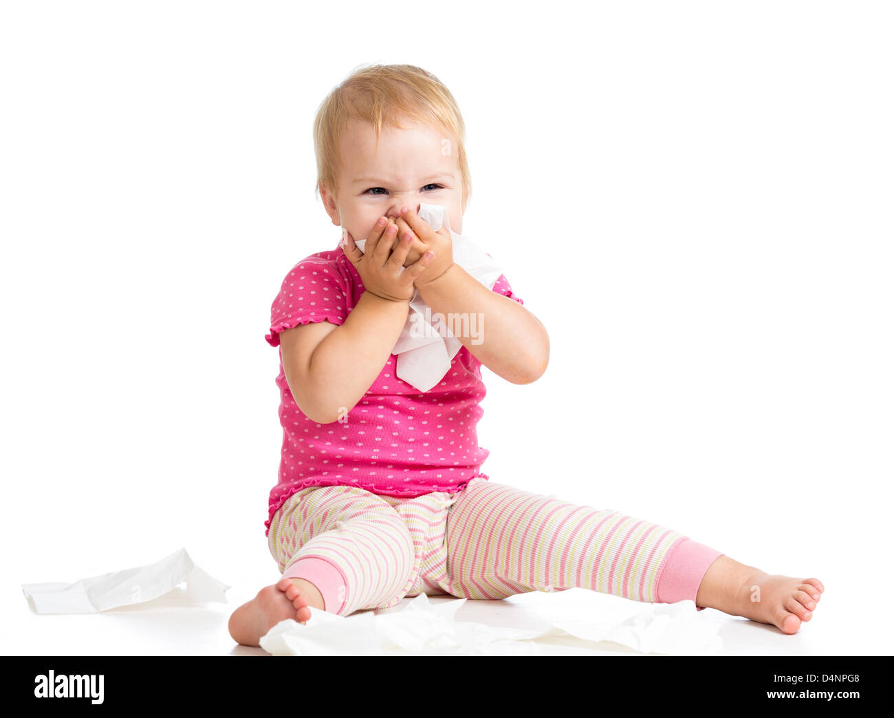 kid cleaning nose with tissue isolated on white Stock Photo - Alamy