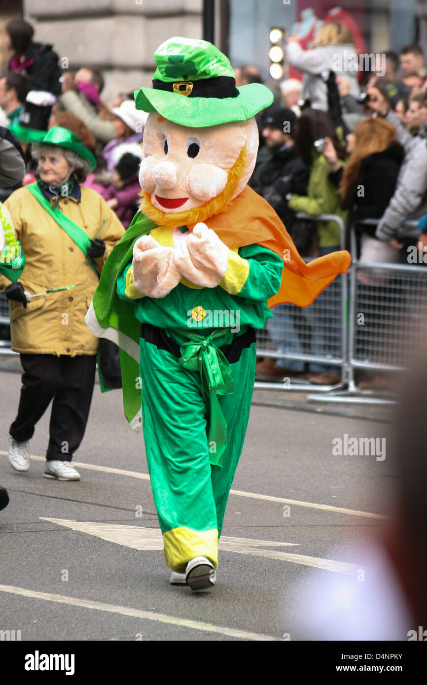 A parade participant in a leprechaun costume St Patrick's festival