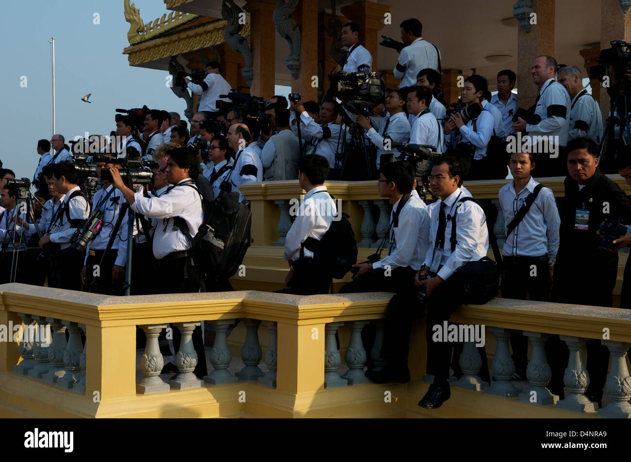 the Press set up to shoot the Royal procession of King Norodom Sihanouk in front of The Royal Palace, Phnom Penh, Cambodia. credit: Kraig Lieb Stock Photo