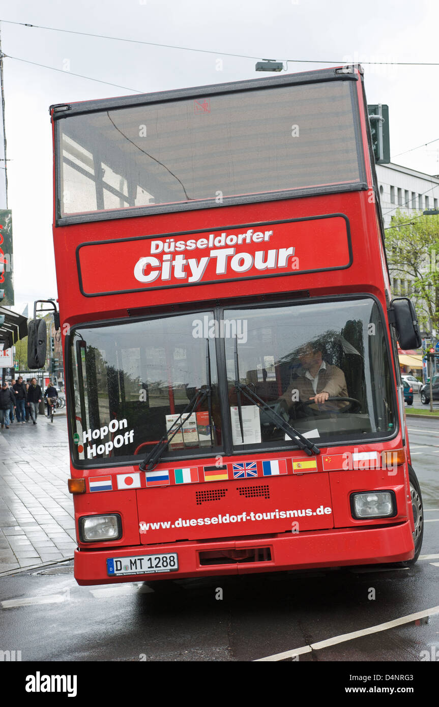 Dusseldorf hop-on hop-off city tour double-decker bus Stock Photo