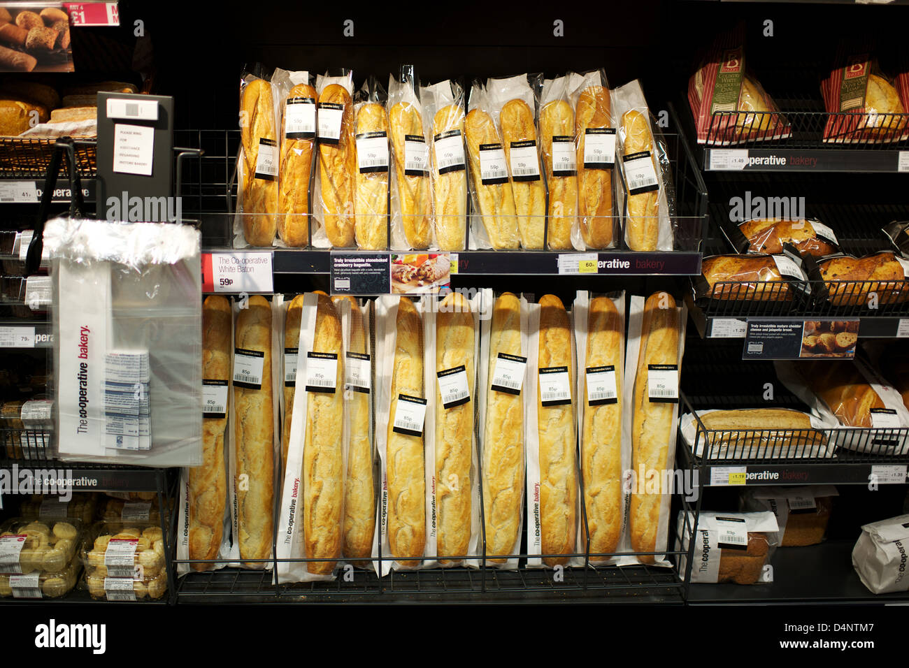 French stick loaves on supermarket shelves hires stock photography and