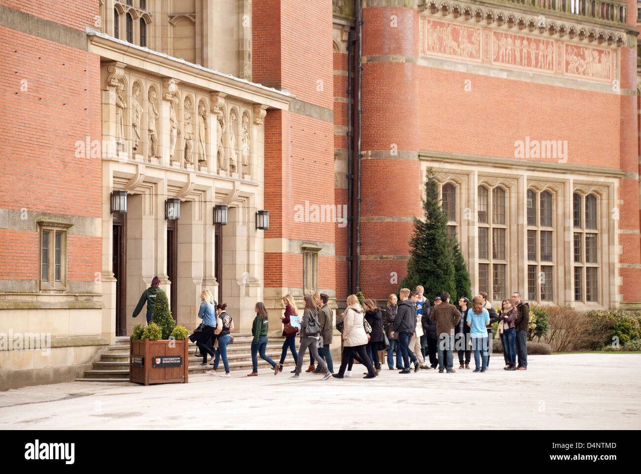 People in Chancellors Court, Birmingham University, a red brick