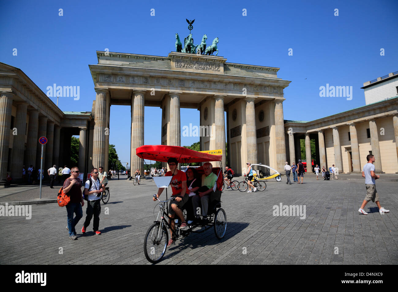 Rikschatour at Brandenburg Gate, Brandenburger Tor, Berlin, Germany Stock Photo