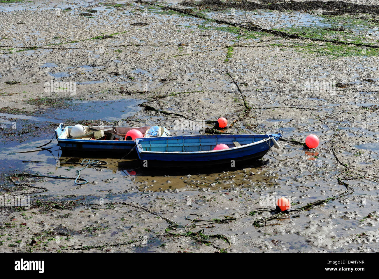 Fishing boats at low tide in goury harbor hi-res stock photography and ...