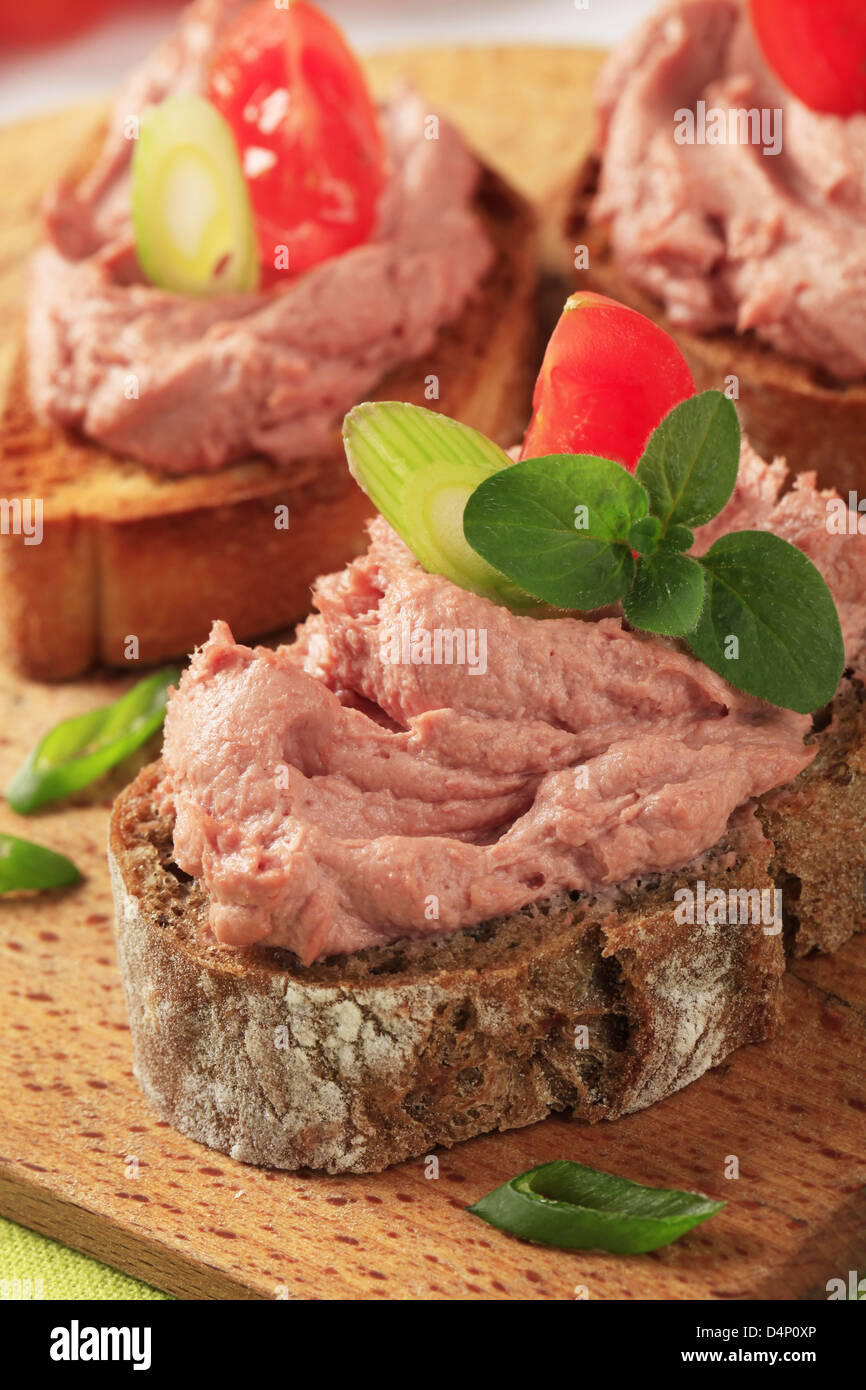 Slices of bread with smooth meat spread Stock Photo Alamy