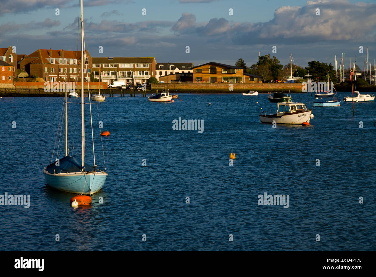 boats at anchor late afternoon Emsworth harbour  hampshire uk Stock Photo