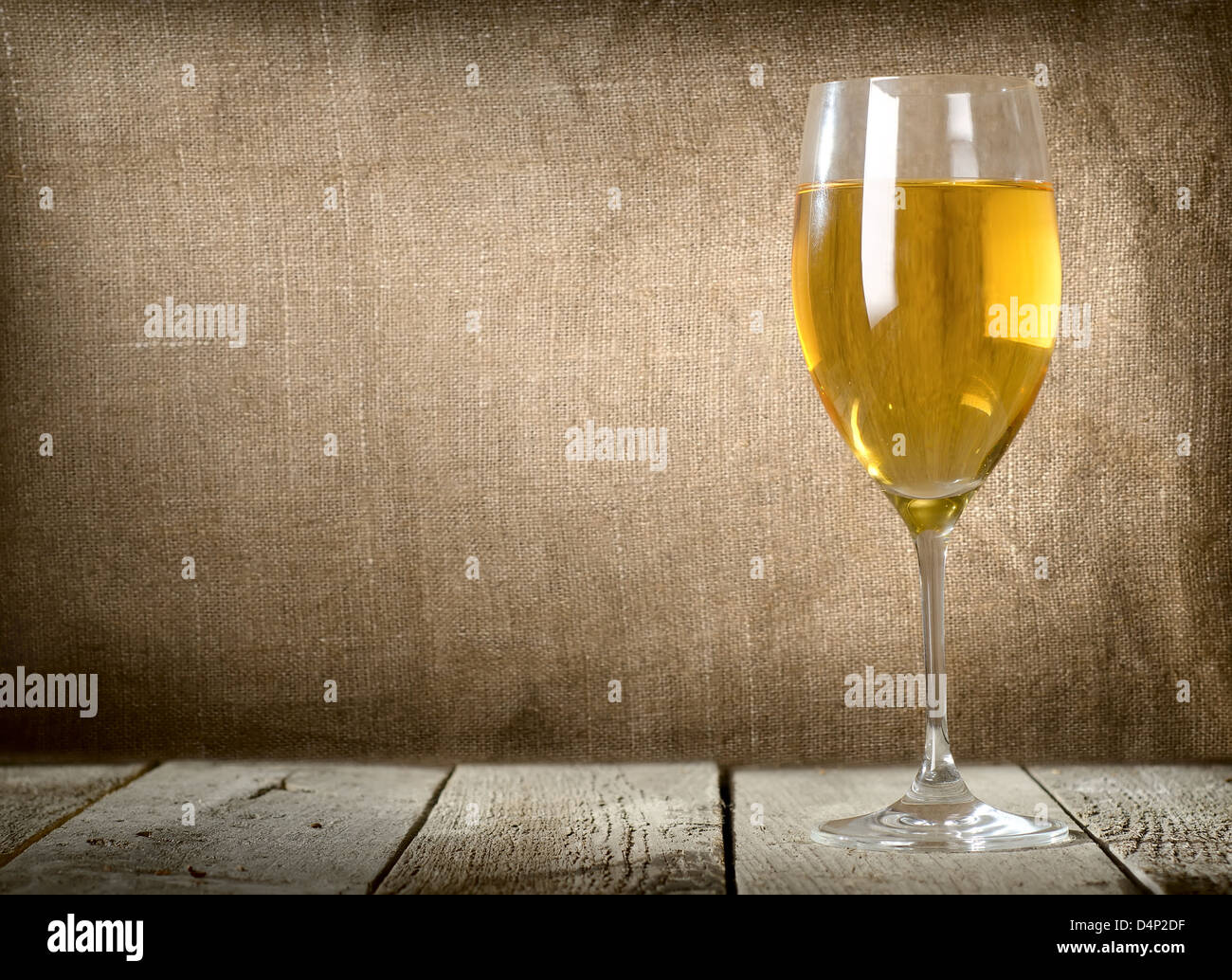White wine glass on the wooden table Stock Photo