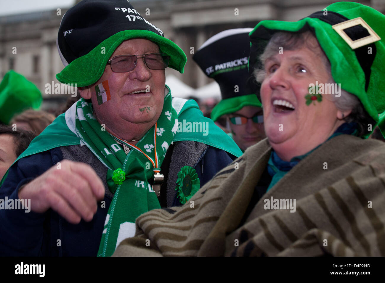 London, UK. 17th March 2013 St Patrick’s Day celebrations in London bring hundreds of people to Trafalgar Square. Revelers were treated to live music, dancing, food stalls and comedy. Stock Photo