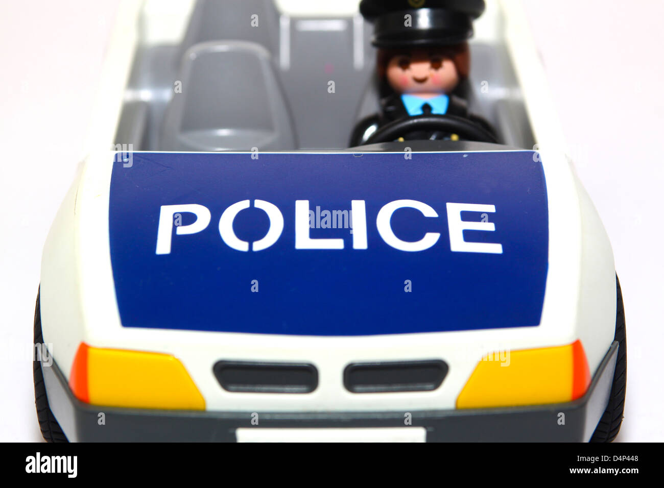 Plastic toy police car emergency concept service Stock Photo