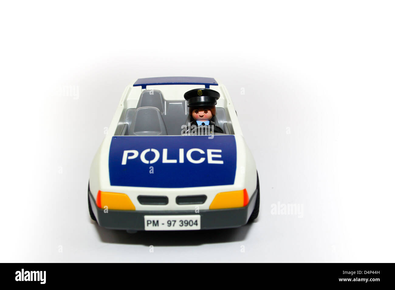 Plastic toy police car emergency concept service Stock Photo