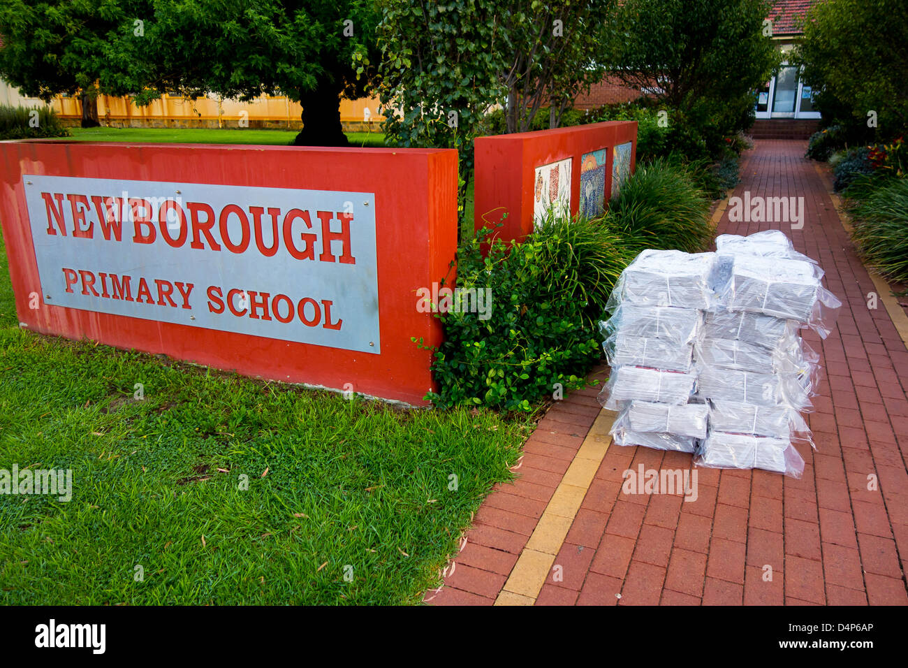 School entrance with paper delivery Stock Photo