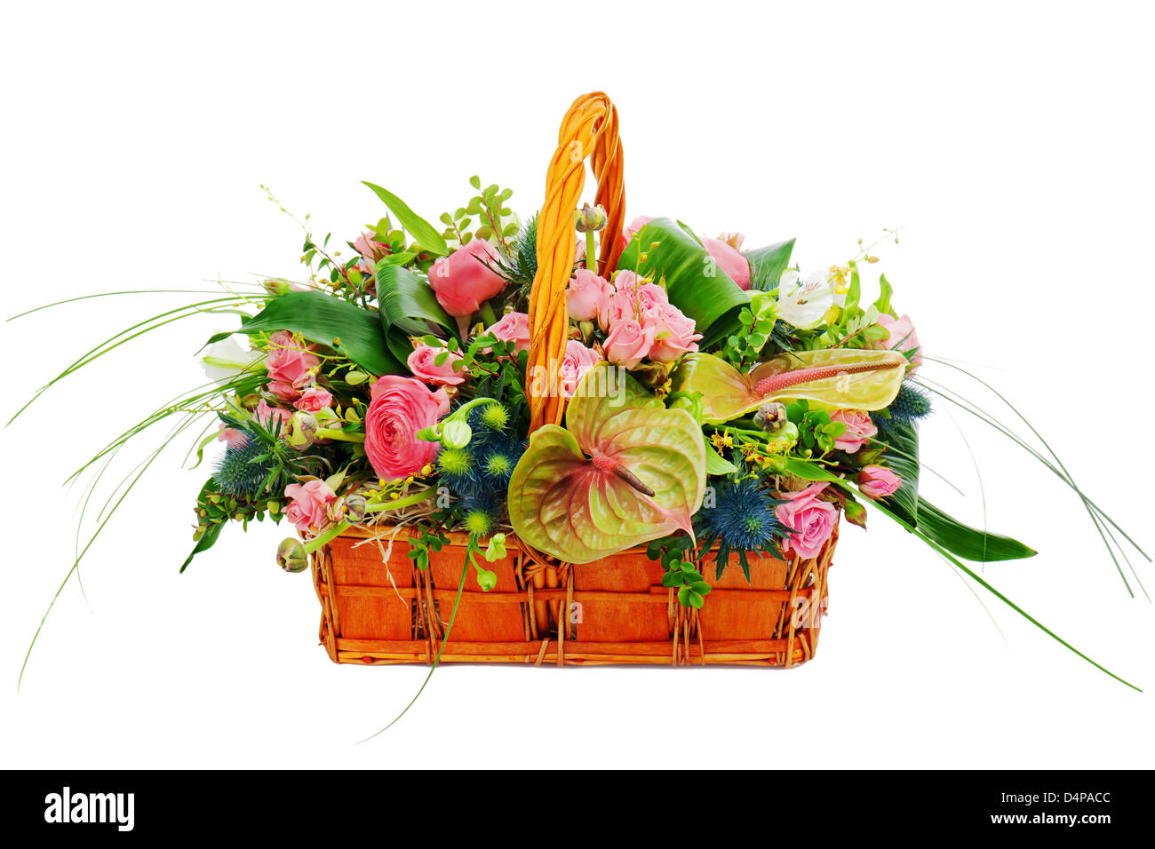 Flower bouquet arrangement centerpiece in a wicker gift basket isolated