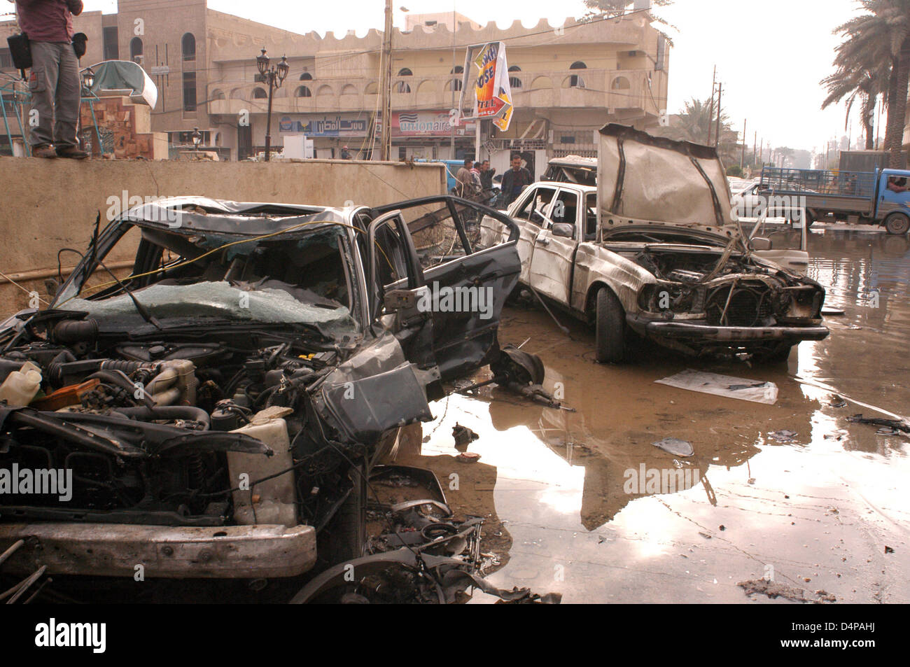 Eight people killed in car bomb attack committed on New Year's Night 2003 at Nabil restaurant in Baghdad in which 12 foreigners and three Iraqi families celebrating the New Year. The injured are three journalists 'Los Angeles Times'. Stock Photo