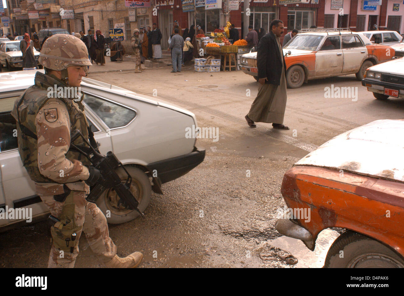 A Spanish soldier patrol the streets of Diwaniyah. Stock Photo