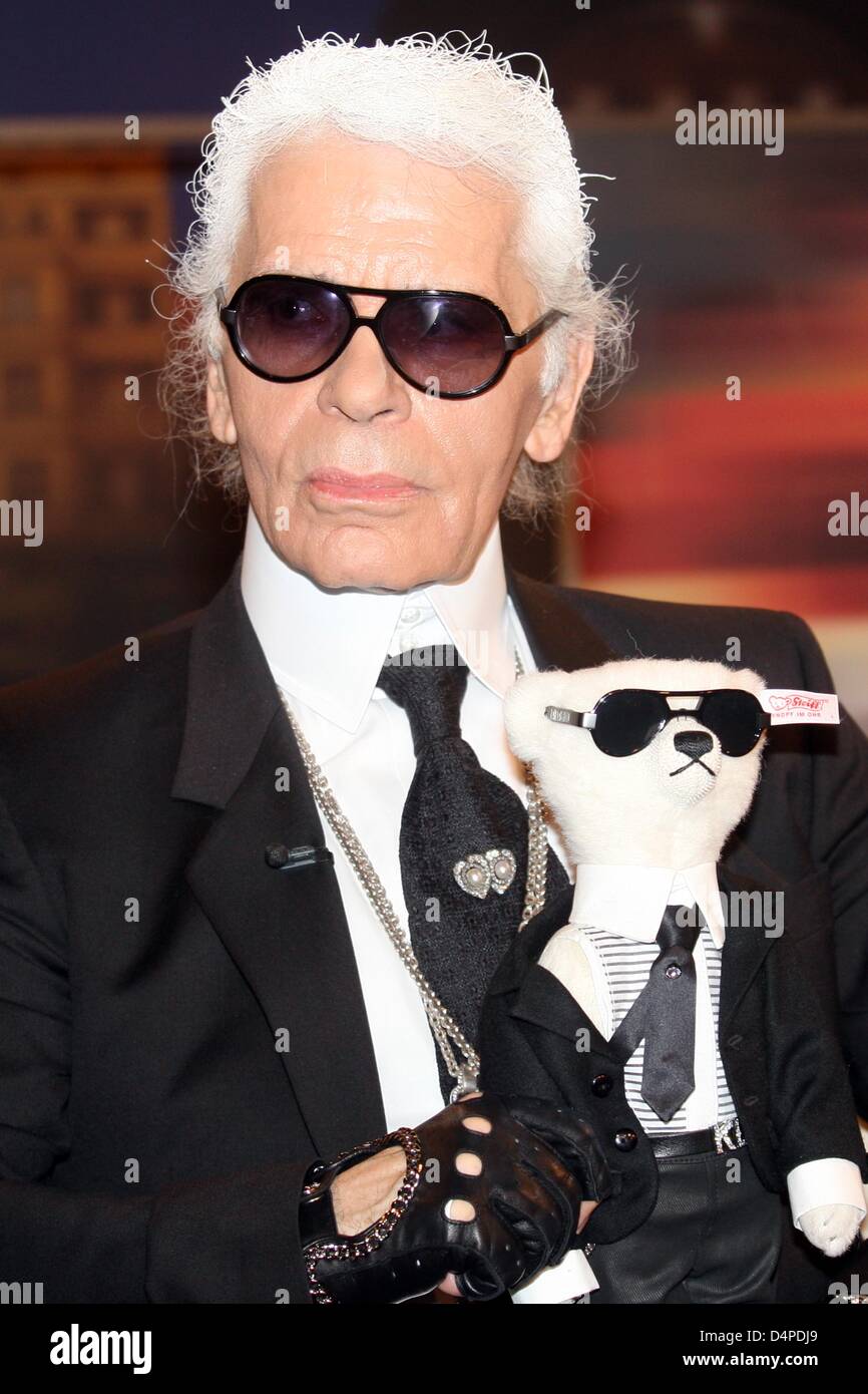 Fashion designer Karl Lagerfeld poses with his ?Steiff Teddy Bear? after  the recording of the ZDF tv talkshow Johannes B. Kerner in Hamburg,  Germany, 08 June 2009. A limited edition of 2,500