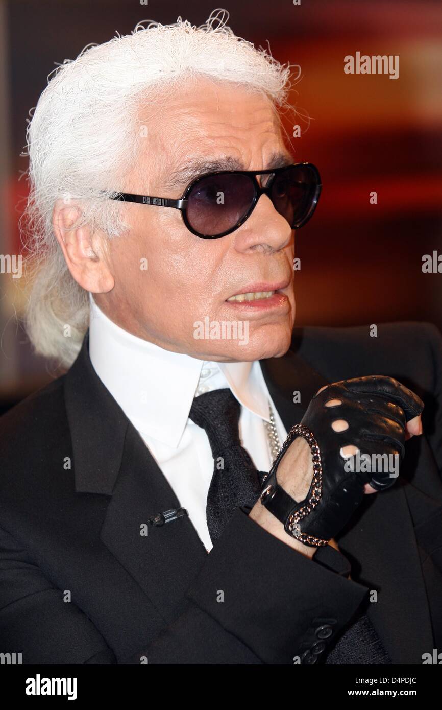 Fashion designer Karl Lagerfeld poses with his ?Steiff Teddy Bear? after  the recording of the ZDF tv talkshow Johannes B. Kerner in Hamburg,  Germany, 08 June 2009. A limited edition of 2,500