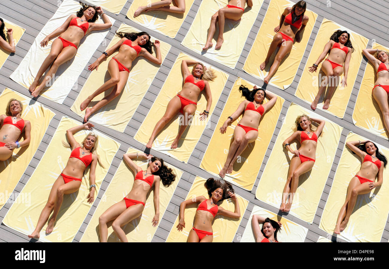 The candidates for the Miss Germany pageant lie in the sun in Palma de Mallorca, Spain, 12 June 2009. The 22 candidates will have a guest appearance when German TV show ?Wetten,dass..?? broadcasts live from the Balearic island. Photo: Patrick Seeger Stock Photo