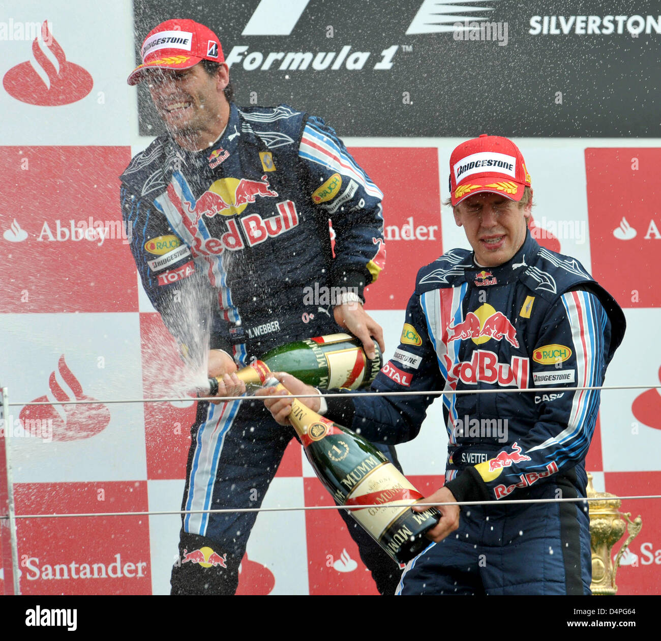 Red Bull driver Sebastian Vettel of Germany celebrates on his car