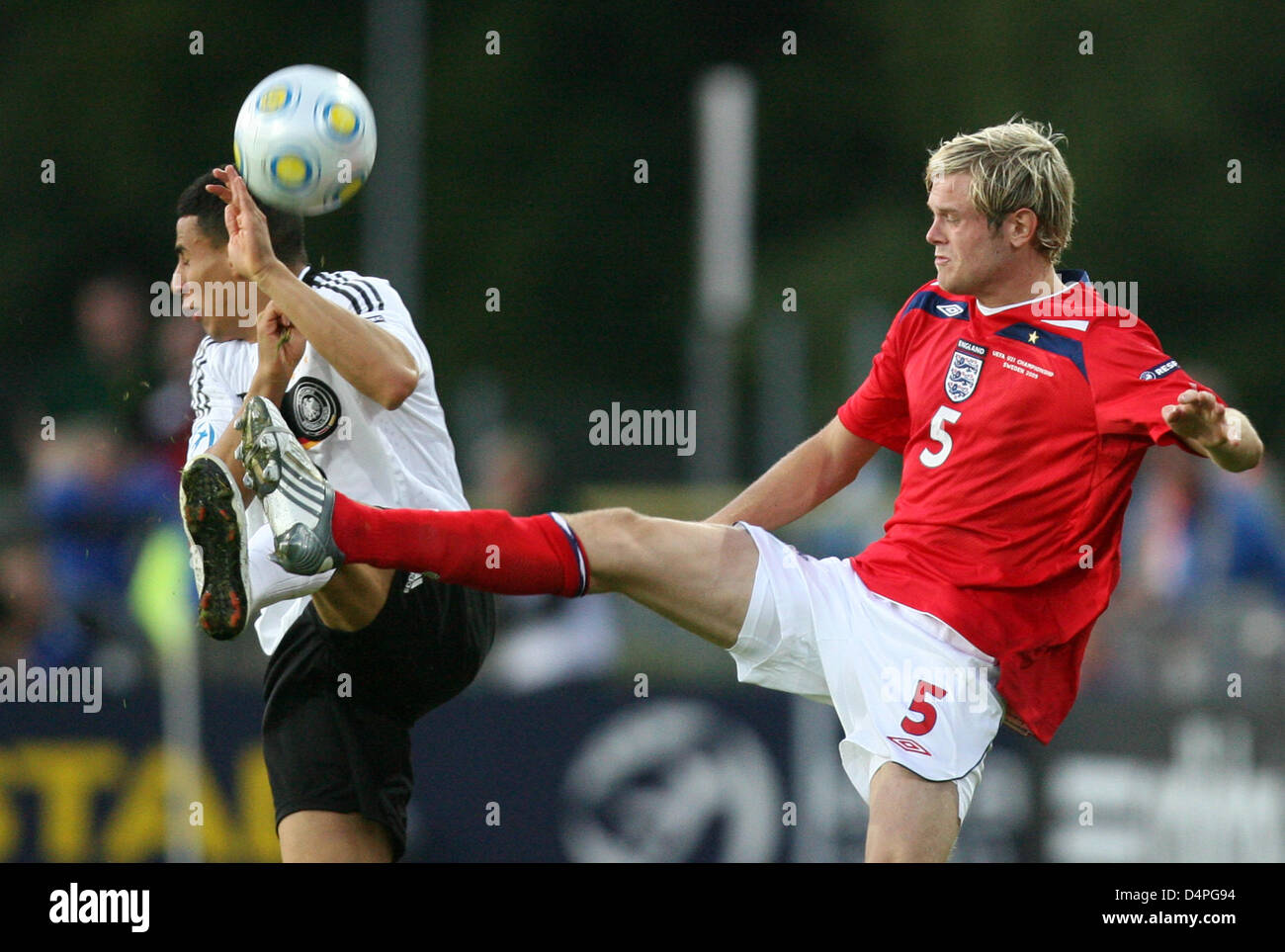 Germany?s Aenis Ben-Hatira (L) and England?s Richard Stearman (R) vie for the ball during the UEFA Under21 Championships group B match Germany v England at Orjans Vall stadium in Halmstad, Sweden, 22 June 2009. The match ended in a 1-1 draw, both sides move up to semi-finals. Photo: Friso Gentsch Stock Photo