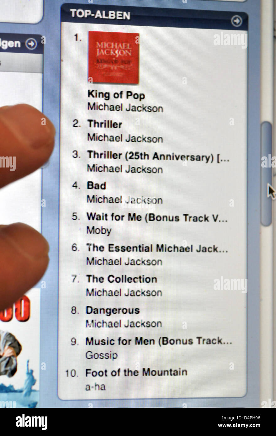 Michael Jackson?s album ?King of Pop? tops the charts of the hit albums of  the internet music store iTunes in Hanover, Germany, 28 June 2009.  Jackson?s fans stormed German record shops at