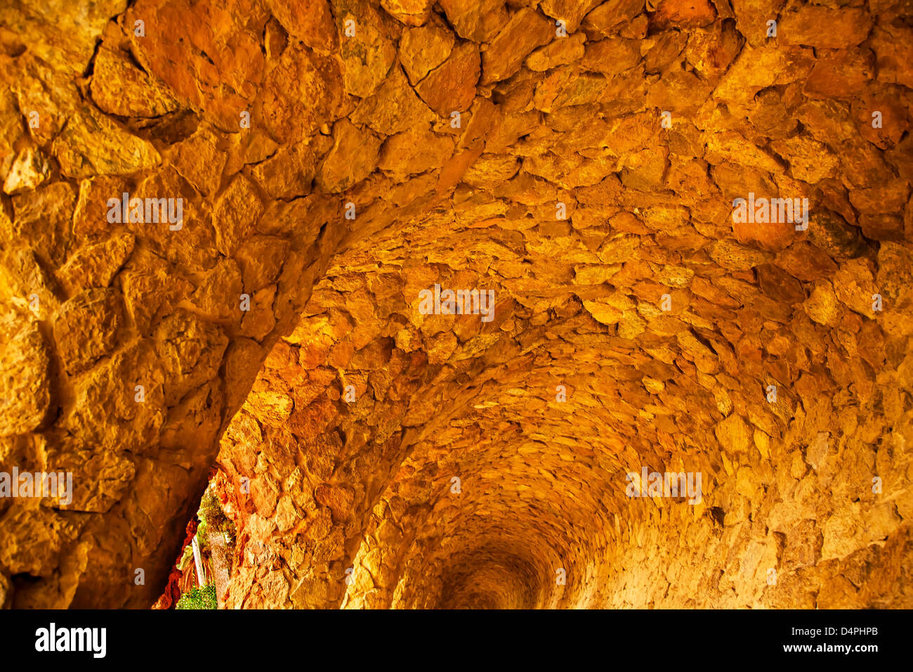 Colonnaded Footway Under Viaduct designed by Antoni Gaudi Guell Park, Barcelona, Catalonia, Spain Stock Photo