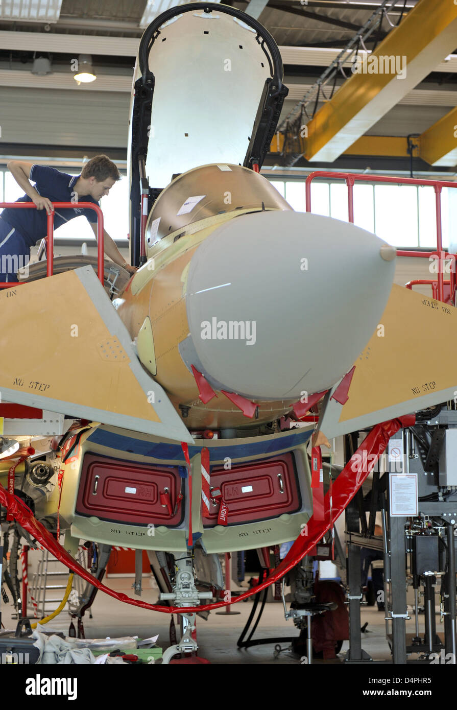 An employee of EADS Germany?s unit Military Air Systems (MAS) works on