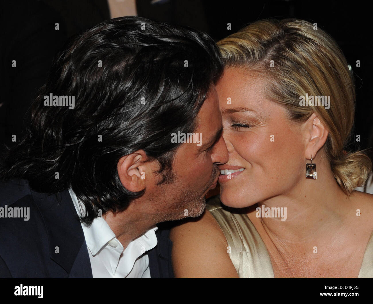 Singer Thomas Anders and his wife Claudia Weidung-Anders kiss during the  presentation of the label ?Gant? at the Mercedes-Benz Fashion Week in  Berlin, Germany, 01 July 2009. Spring/Summer 2010 fashion trends are