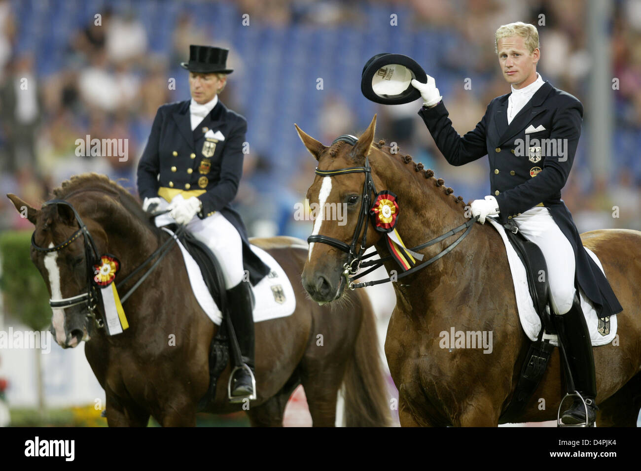 German dressage riders Matthias Alexander Rath and Heike Kemmer sit on their horses at the World Equestrian Festival CHIO Aachen, Germany, 02 July 2009. The German team only won the silver medal in the Nations Cup of the world?s largest riding competition; the Dutch team finished on the first place. Photo: Rolf Vennenbernd Stock Photo