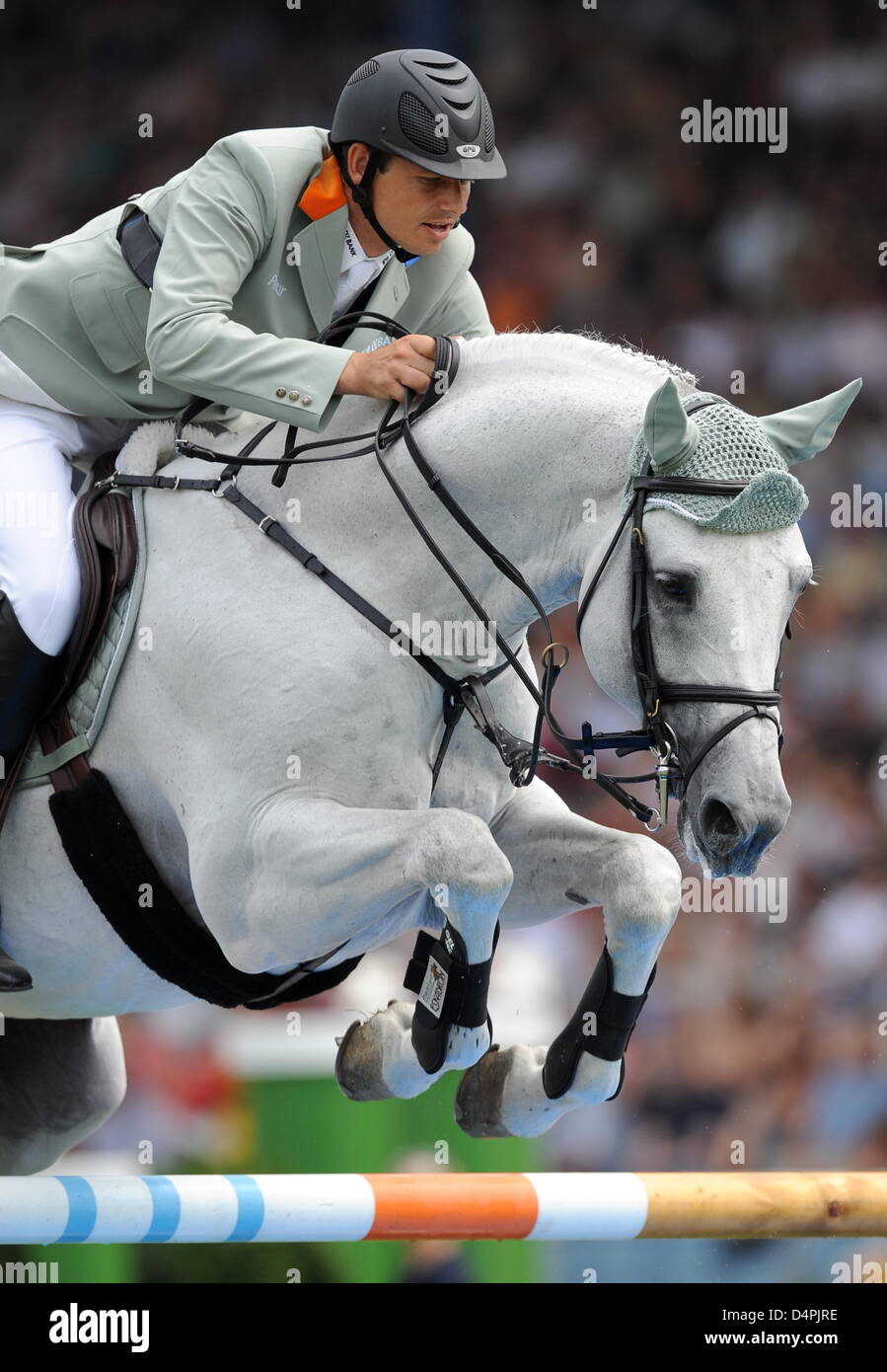 Germany?s jumping equestrian Marco Kutscher and his horse